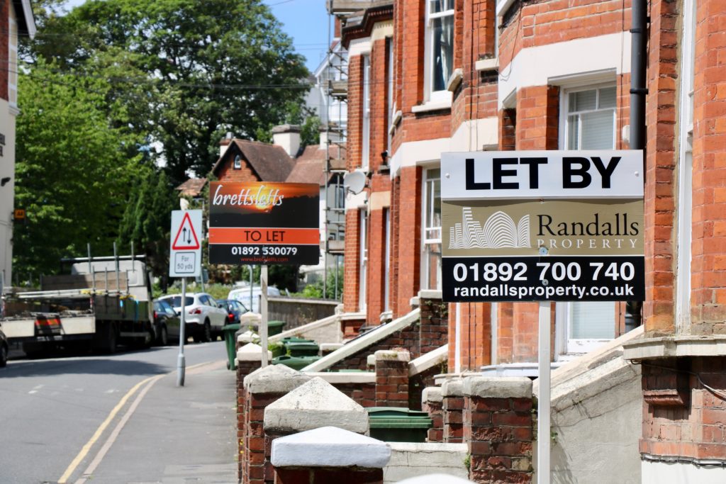 Sign indicating that a house had been rented out
