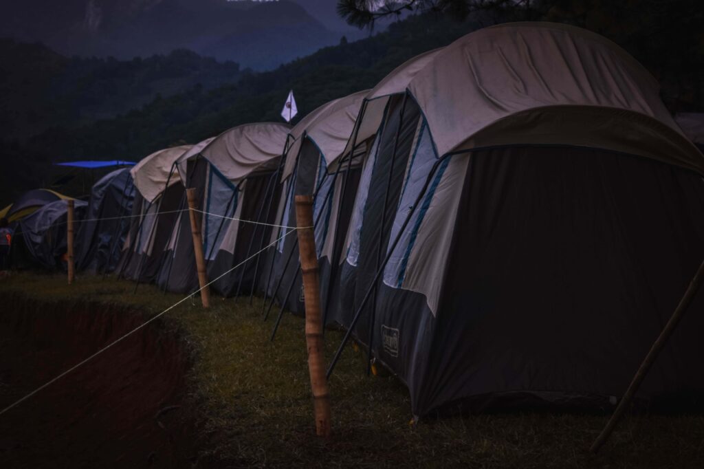 A picture of a campsite in the African bush.Camping in tents is one African safari accommodation option