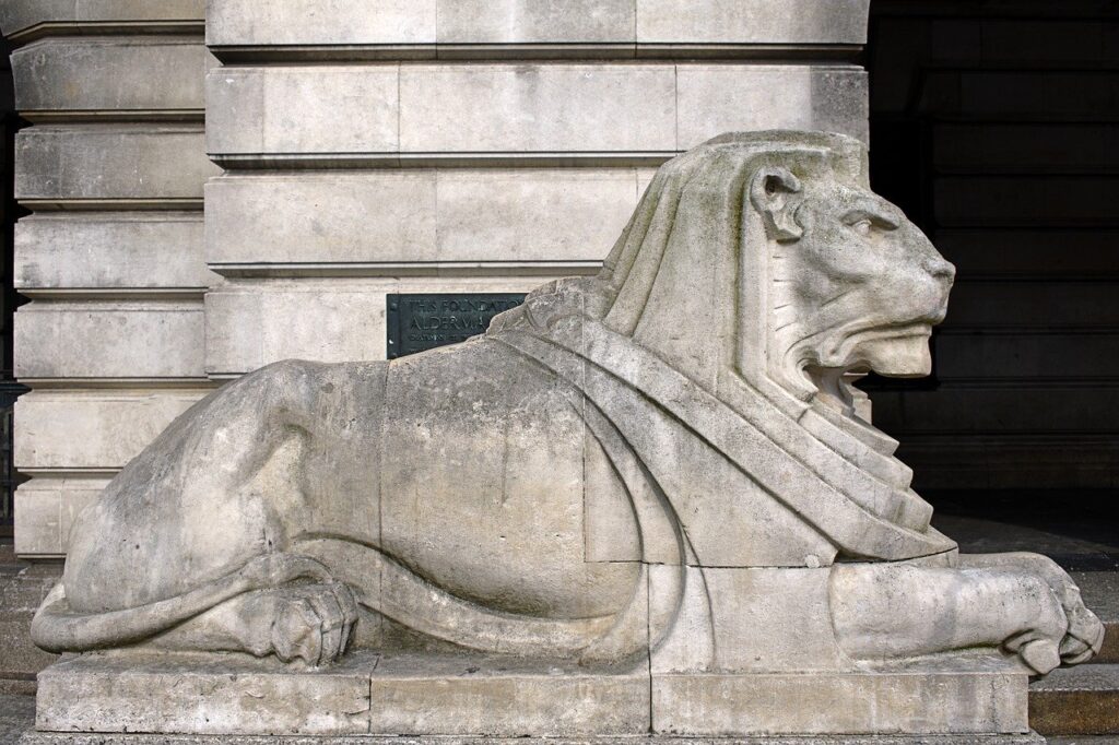 A Statue of a stone lion. This is the Left Lion of Nottingham Courthouse
